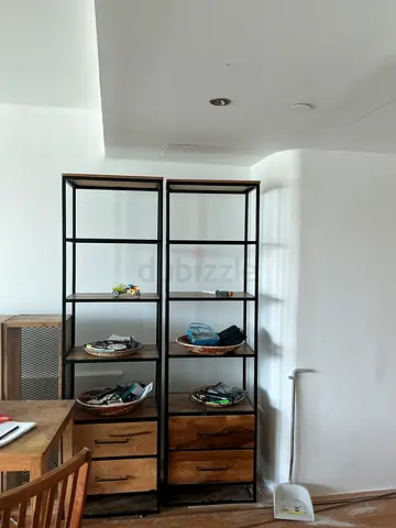 A pair of bookcases 1500aed non negociable mango wood metal