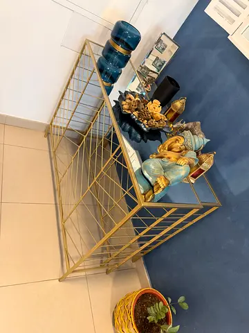 Gold metal console table with glass top - modern entryway table