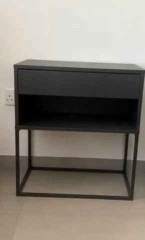 Modern black bedside table with drawer and open shelf