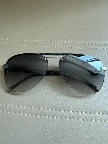 Louis Vuitton Clockwise Canvas sunglasses Black / Grey