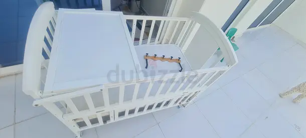 Baby crib with mattress