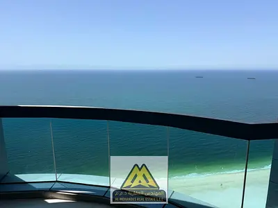 2 Bedroom Apartment for Rent in Corniche Tower Ajman with Full Sea View High Floor and Free Parking