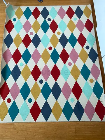 Colorful geometric patterned area rug - decent condition