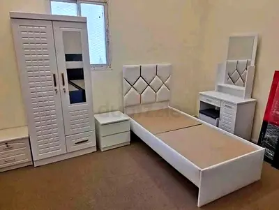 White single bed set with wardrobe, bedside table and dressing table