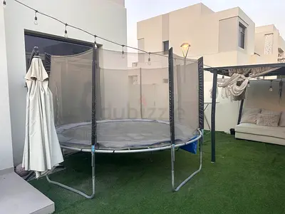 Large Outdoor Trampoline with Safety Net - Good Condition