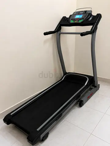 Used electric treadmill with digital console — good working condition