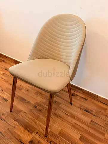 Modern white marble-effect dining table with 6 beige chairs
