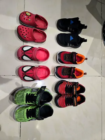Lot of 8 pairs of kids shoes — various sizes and styles, gently used