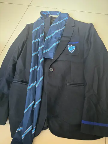 Gems Metropole School blazer with matching striped tie - good condition