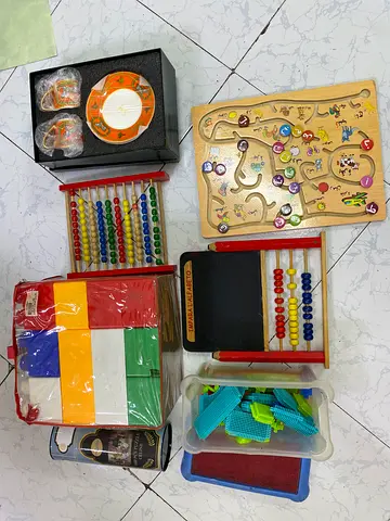 For free Mixed kids learning toys bundle — abacus, puzzles, blocks activity set