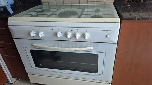 Bompani 4+1 burner cooking range with Electric Oven-urgent sale