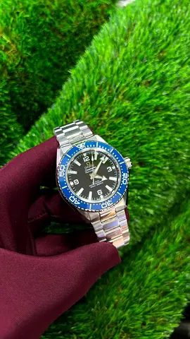 Omega Mens stainless steel automatic dive watch with blue bezel