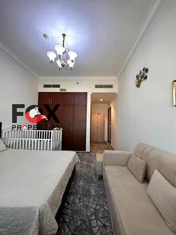 🌊🏙️ Below Market Price! Huge 1BR Apartment with Partial Sea View in Cornish Tower, Ajman 🏙️🌊