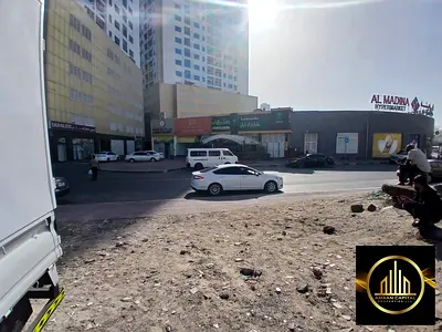 Residential and commercial plot (G+8) opposite the Ajman Pearl Towers – freehold