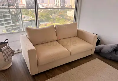 Hallarp beige two seater sofa bed with mattress