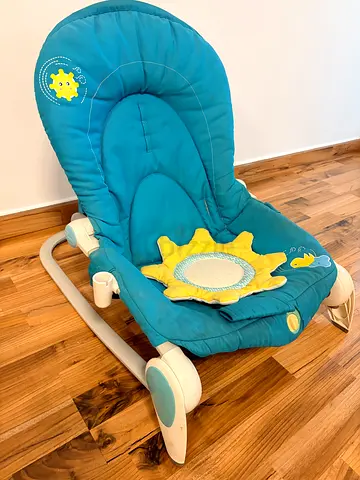 Baby rocker/bouncer seat with sun toy – gently used