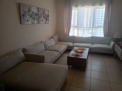 Light beige L-shaped sectional sofa with chaise - good condition