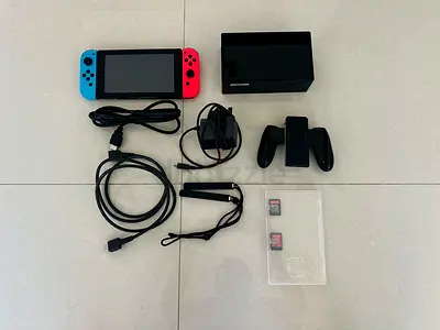 Nintendo Switch console + 2 games + 128gb micro SD +2 HDMI cable … meet me in the park mamzar park .