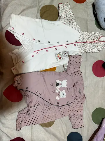 Two baby onesies / rompers (size newborn - few months) - gently used