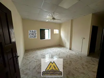 One bedroom and living room for rent in Al Rashidiya 1 - large area and balcony at the lowest price, without elevator and air conditioning