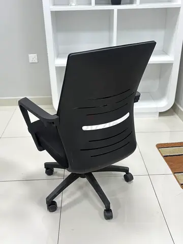 Used Black Office Chair with Armrests and Wheels -