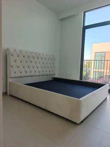 Queen upholstered bed frame with tufted headboard - cream