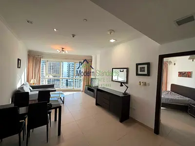 High-Floor 1BR | Goldcrest Executive | Lake & Skyline View | Furnished