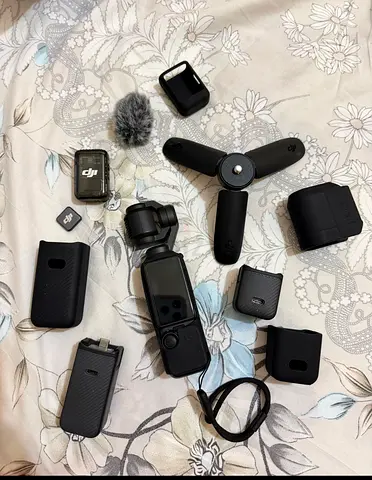 Price negotiable | DJI Osmo Pocket 3 (or Osmo Pocket) with accessories - charger, tripod, mic, cases