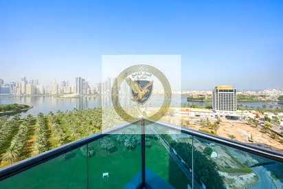 Luxury sea view in Al Majaz with a balcony and the largest space a three-bedroom apartment with a living room, featuring a distinctive view, landlor