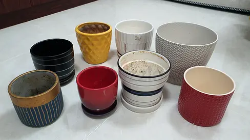 Set of 8 Ceramic Plant Pots in Various Designs