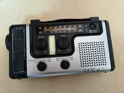 Portable Emergency Radio with Flashlight, Phone Charging  USB Input (Model HT-998)