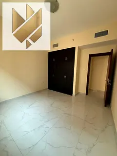 2BR Apartment in New Muwaileh with Parking for Rent