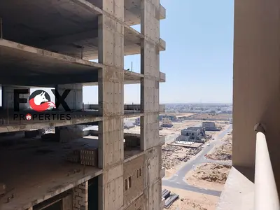 Studio for sale in Al Aamrah Tower, Ajman. 493 sqft, partial Al Zahya view, no parking. AED 220,000 incl. registration fees, excl. commission.
