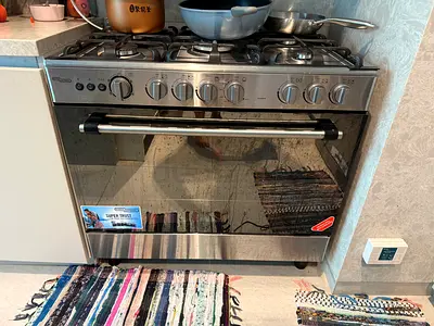 Stainless Steel 5-Burner Gas Cooker with Oven - Used, Good Condition (AED 700)
