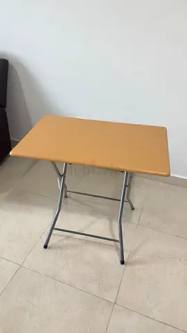 Small folding study table with wooden top and metal legs