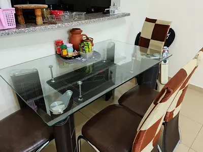 Glass top 4 seater Dining table