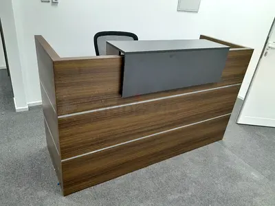 Used wood-effect reception desk with raised counter