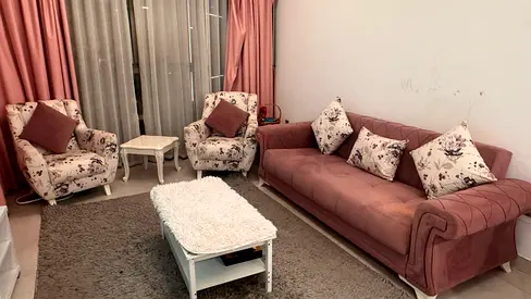 3-seater mauve sofa with 2 patterned armchairs and coffee table - good condition