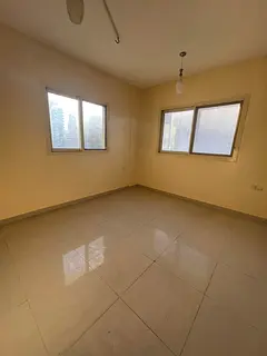 A premium apartment with unpaved parking in Al Musalla area