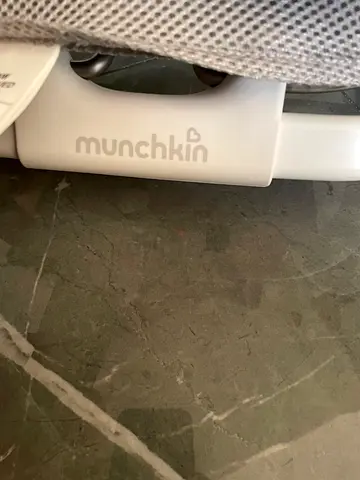 Munchkin baby bouncer seat - light grey (used)