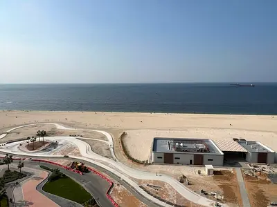 Three bedrooms, living room, 3 bathrooms, balcony, central air conditioning, free maintenance, Ajman Corniche