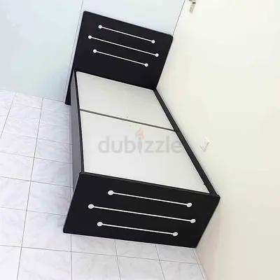 Single bed frame with headboard and storage panels - dark finish