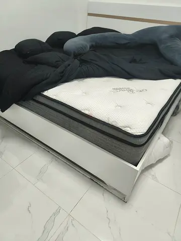 White king bed frame with mattress  top mattress - good condition