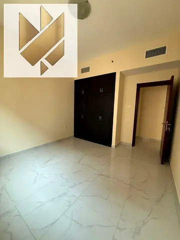 2BR Apartment in New Muwaileh with Parking for Rent