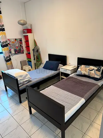 Two single wooden beds without mattress - good condition