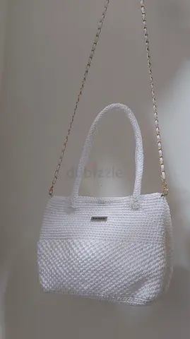 White woven shoulder bag with chain strap