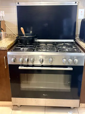 Stainless steel freestanding gas range with oven - good working condition