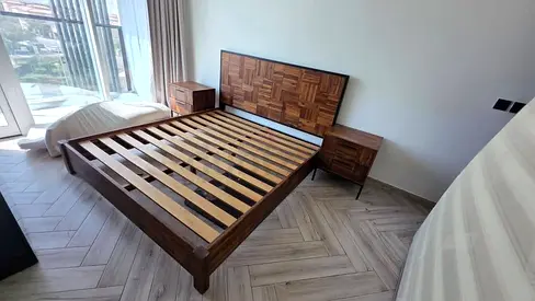 Selling luxury wooden bed with tow side table and with mattress like new