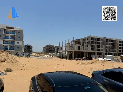 فرصة استثمارية ذهبية | أرض سكنية تجارية في العالية جلوبال سيتي | تصريح أرضي + 4 طوابق + ميزانين | تملك حر