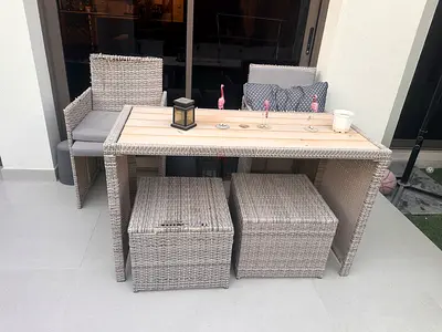 6-piece Outdoor Rattan Dining Set with Cushions and Storage Stools